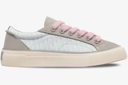 Side view of Dior B33 women's sneaker in grey and white Oblique jacquard with thick pink laces. - SKU 3SN303ZWN_H858