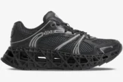 Side profile of a black Dior B35 NXXT sneaker with a 3D-printed lattice sole and mesh upper. - SKU 3SN323ZCY_H968