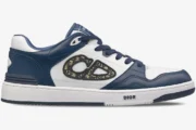 Side view of Dior B57 Dribble low-top sneaker in blue and white leather with CD logo. - SKU 3SN318ZXU_H553