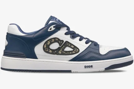 Side view of Dior B57 Dribble low-top sneaker in blue and white leather with CD logo. - SKU 3SN318ZXU_H553