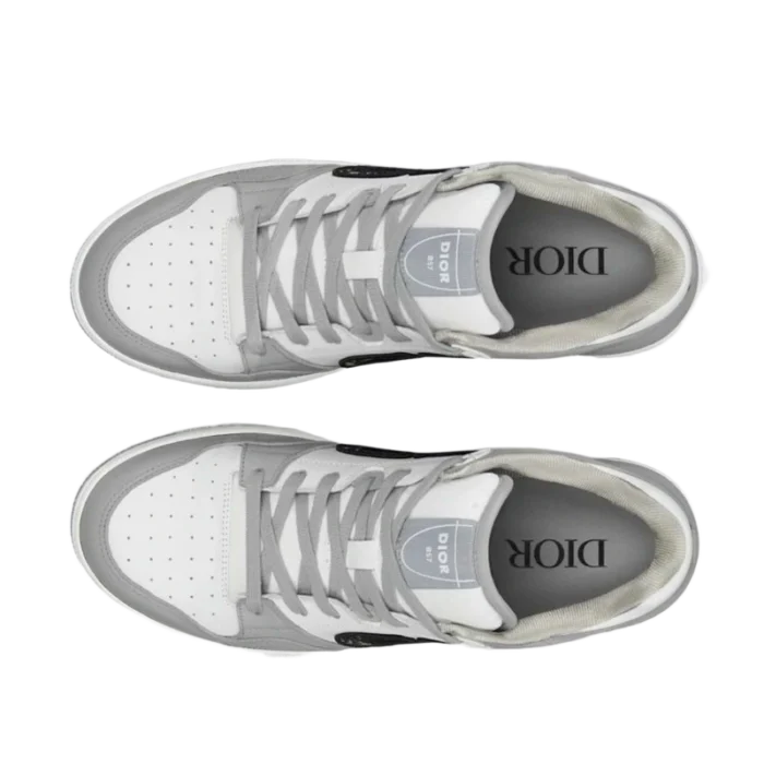 Top-down view of white and grey Dior B57 Dribble low-top sneakers with grey laces. - SKU 3SN318ZXU_H860