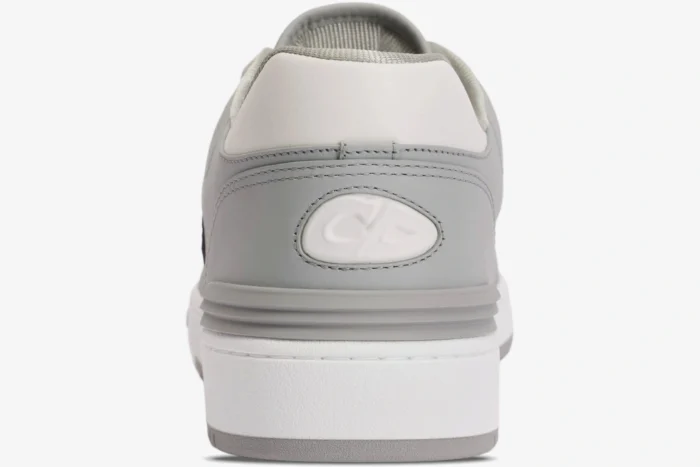 Rear view of Dior B57 Dribble Low-Top Sneaker in white and grey leather with CD logo on the heel. - SKU 3SN318ZXU_H860