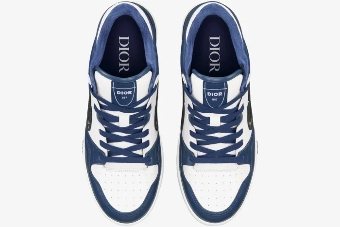 Top-down view of Dior B57 low-top sneakers in blue and white leather with navy laces. - SKU 3SN318ZXU_H553