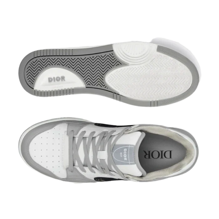 Top-down view of Dior B57 sneakers in white and grey, showing the outsole and interior insole. - SKU 3SN318ZXU_H860