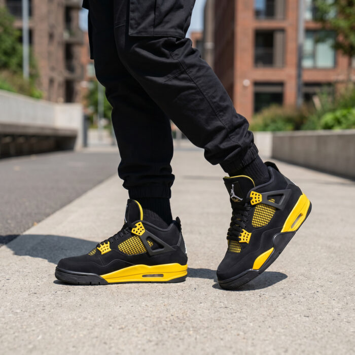Air Jordan 4 Retro Thunder Black and Tour Yellow [Lifestyle AI]