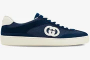 Side profile of a Gucci G74 Interlocking G blue suede sneaker with white sole and laces. - SKU 791742AADM04141