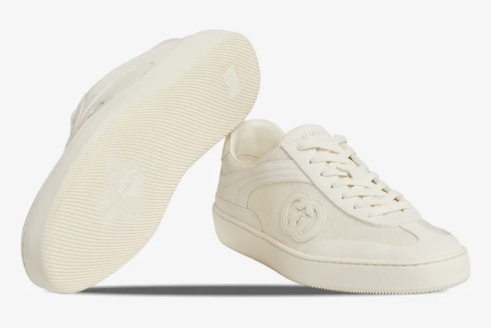Off-white Gucci Interlocking G sneakers showing side profile and textured sole with bee emblem. - SKU 791742AADM09110