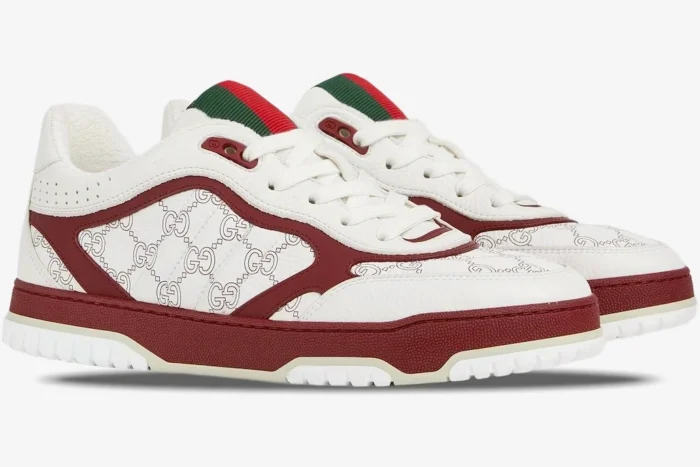 Gucci Re-Web sneakers in white and Rosso Ancora, side profile view showing interlocking G pattern. - SKU 850193AAFOO9043