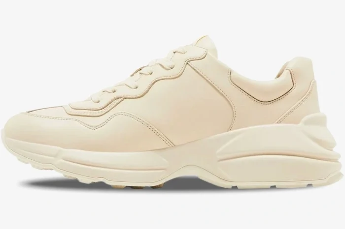 Gucci Rhyton Interlocking G ivory leather sneaker shown from a side profile view. - SKU 757857UPG709567