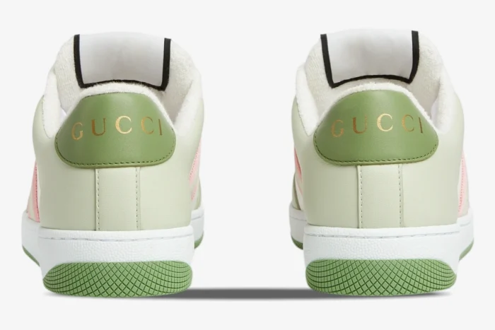 Rear view of Gucci Screener GG Canvas sneakers in green, white, and pink with gold heel logo. - SKU 806629FADXS9158