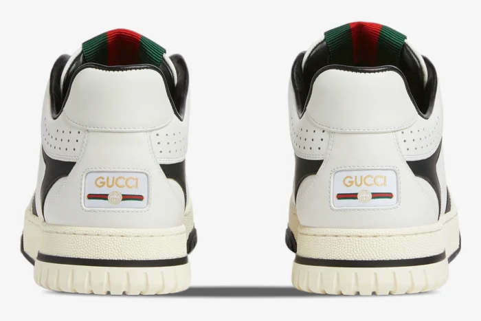 Rear view of Gucci Women's Re-Web sneakers in white and black, showing heel logos. - SKU 786186AADPM9055