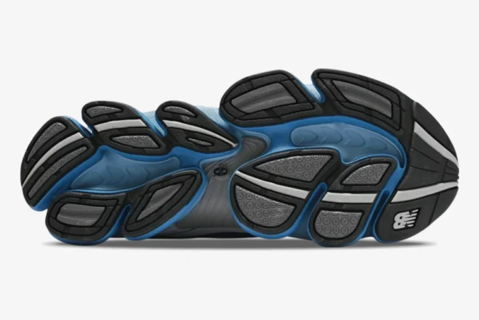 New Balance 2000 Still Water Blue Agate outsole view with textured blue and grey traction pods. - SKU U2000PBB