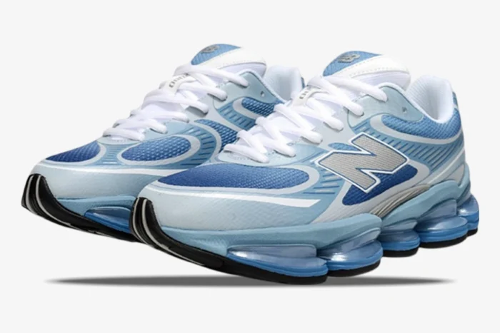 New Balance 2000 sneakers in Still Water and Blue Agate, three-quarter view showing mesh and chunky soles. - SKU U2000PBB