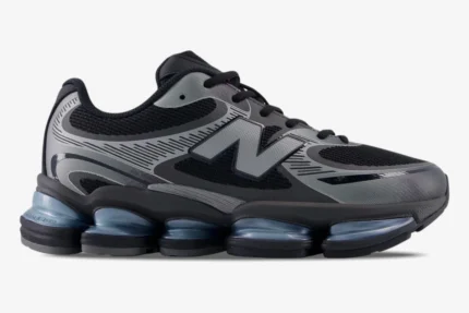 Side view of New Balance Abzorb 2000 sneakers in black and silver metallic with chunky soles. - SKU U2000EA
