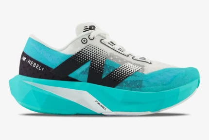 Side profile of New Balance FuelCell Supercomp Elite V4 running shoe in Cyber Jade and black. - SKU WFCXCJ4