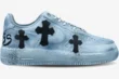 Side profile of a custom Nike Air Force 1 in metallic silver with black Chrome Hearts cross patches.