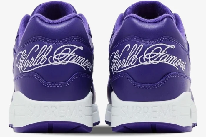 Rear view of Nike Air Max 1 x Supreme Purple White sneakers with World Famous embroidery. - SKU HF8813-500