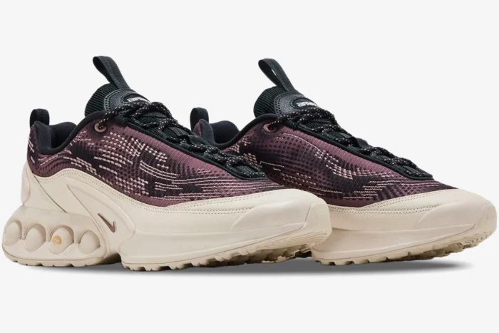 Three-quarter view of Nike Air Max Dn sneakers in Smokey Purple and Beige with unique circular air units. - SKU HQ0912-200