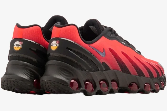 Rear view of Nike Air Max DN8 sneakers in red and black featuring a unique multi-bubble sole. - SKU FQ7860-008