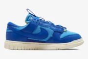 Nike Dunk Low Remastered Jumbo Blue sneaker in a side profile view featuring various shades of blue. - SKU DV0821-400