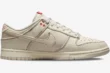 Nike Dunk Low SE Sashiko Light Orewood Brown sneaker in a side profile view with red stitching details. - SKU DV0834-100