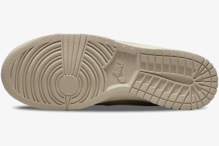 Outsole view of the Nike Dunk Low SE Sashiko in Light Orewood Brown showing the traction pattern. - SKU DV0834-100