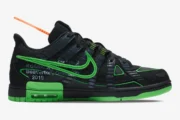 Side profile of Nike Air Rubber Dunk x Off-White Green Strike sneakers with black mesh and neon green accents. - SKU CU6015-001