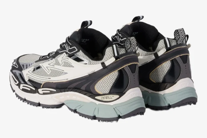 Off-White Be Right Back sneakers in black, white, and grey, shown from a rear three-quarter angle. - SKU OMIA295C99FAB0010510