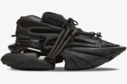 Side profile of a Balmain Unicorn chunky sneaker in all black with a futuristic sculptural design. - SKU BM1VJ309KNSC