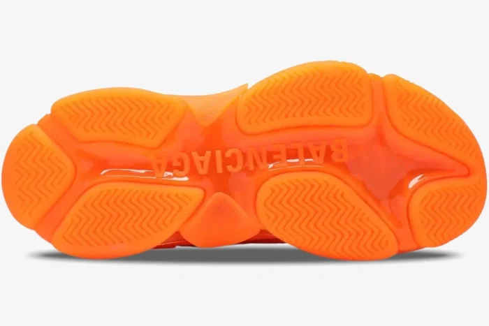 Bottom view of the Balenciaga Triple S Sneaker in Clear Sole Orange showing the branded rubber outsole.
