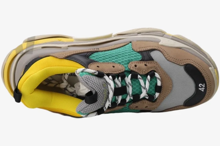 Top-down view of Balenciaga Triple S Curry sneakers with brown, yellow, and green accents. - SKU 533882W09O22311