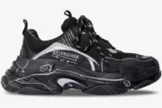 Balenciaga Triple S 'Sketch - Black' sneaker in a side profile view with white hand-drawn graphics.