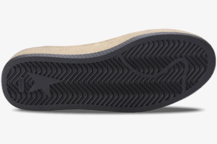 Bottom view of Golden Goose Ball Star sneaker showing black rubber sole with herringbone tread and star logo. - SKU GMF00117.F000638.10273