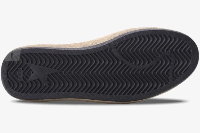 Bottom view of a Golden Goose Ball Star sneaker showing the black herringbone patterned rubber outsole. - SKU GMF00117.F002558.10915