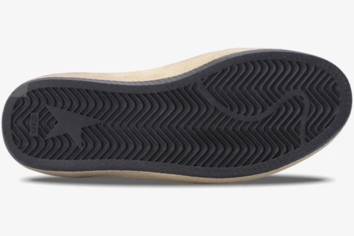 Bottom sole view of Golden Goose Ball Star sneakers featuring a black rubber herringbone tread and star logo. - SKU GWF00117.F002564.10273