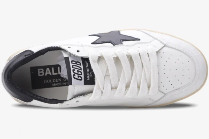 Top-down view of a Golden Goose Ball Star Sport Sneaker in white and black with white laces. - SKU GMF00117.F002554.10100