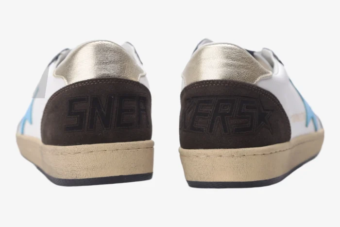Back view of Golden Goose Ball Star white leather sneakers with brown suede heels and gold trim. - SKU GMF00117.F002573.10915