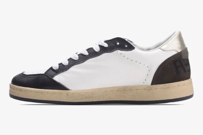 Side view of Golden Goose Ball Star sneakers in white leather with black, brown, and gold details. - SKU GMF00117.F002573.10915