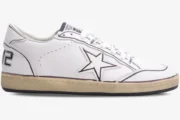 Side view of a white Golden Goose Ball Star sneaker featuring brown outlines and a cream-colored midsole. - SKU GMF00117.F002575.10915