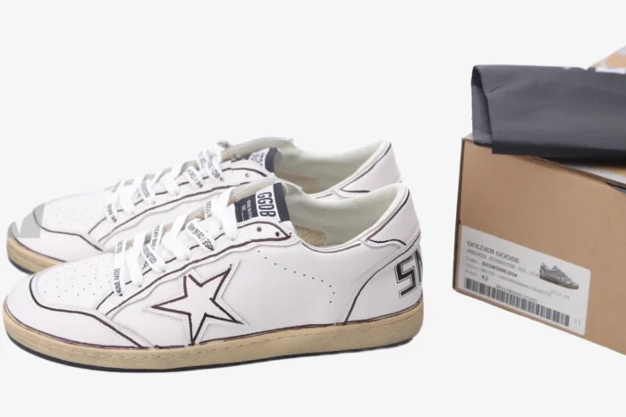 Golden Goose Ball Star white sneakers with brown stripes and star logo, side view shown with original box. - SKU GMF00117.F002575.10915