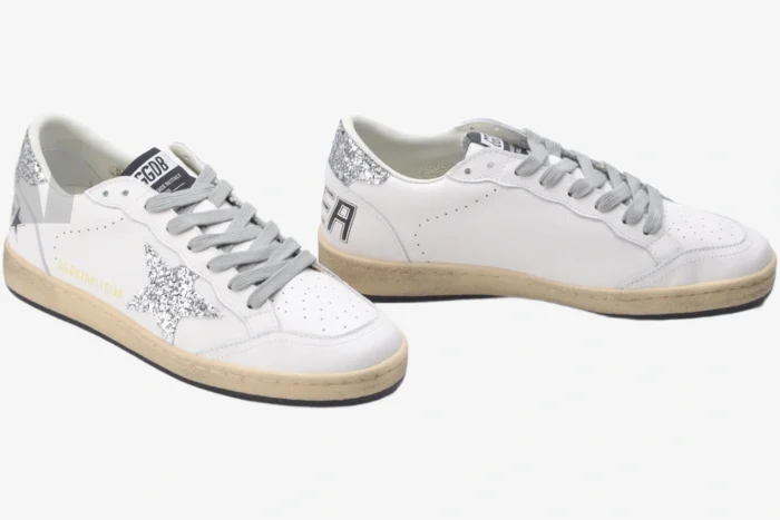 Golden Goose Ball Star white leather sneakers with silver glitter star and heel, three-quarter side view. - SKU GWF00117.F002564.10273