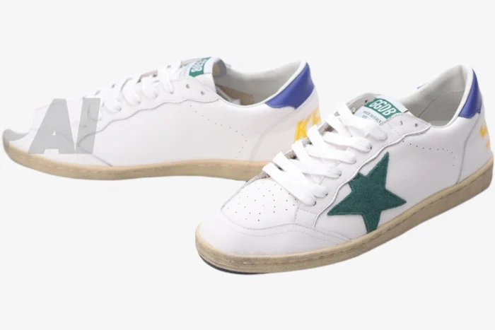 Golden Goose Ball Star white leather sneakers featuring a green star, blue heel tab, and distressed sole, side view. - SKU GMF00117.F002517.10887