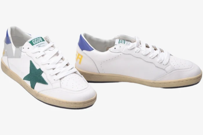 Golden Goose Ball Star sneakers in white leather with a green star and blue heel, three-quarter view. - SKU GMF00117.F002517.10887
