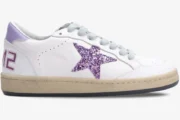 Golden Goose Ball Star white leather sneaker with purple glitter star, side profile view. - SKU GWF00117.F002544.10915