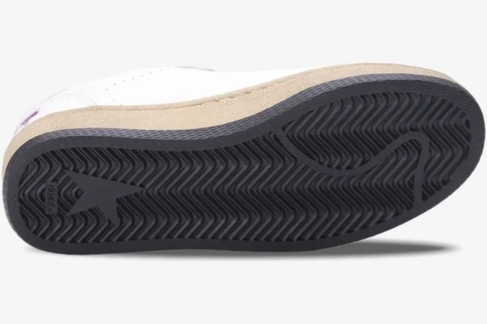 Bottom view of Golden Goose Ball Star sneaker showing black rubber sole with herringbone pattern and star logo. - SKU GWF00117.F002544.10915