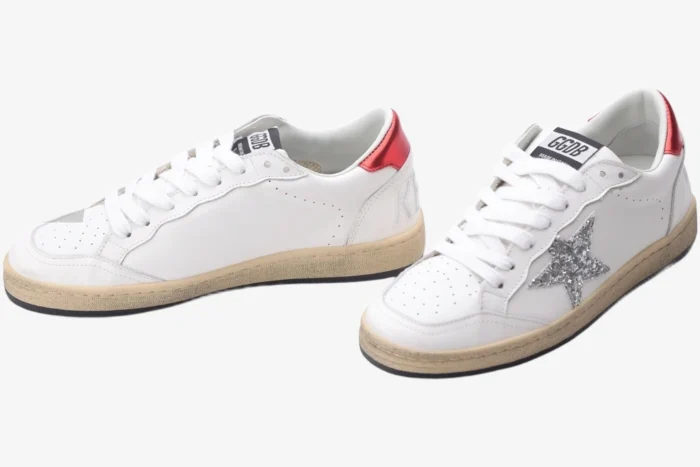 Golden Goose Ball Star sneakers in white leather with red heel and silver glitter star, three-quarter view. - SKU GWF00117.F002517.10892