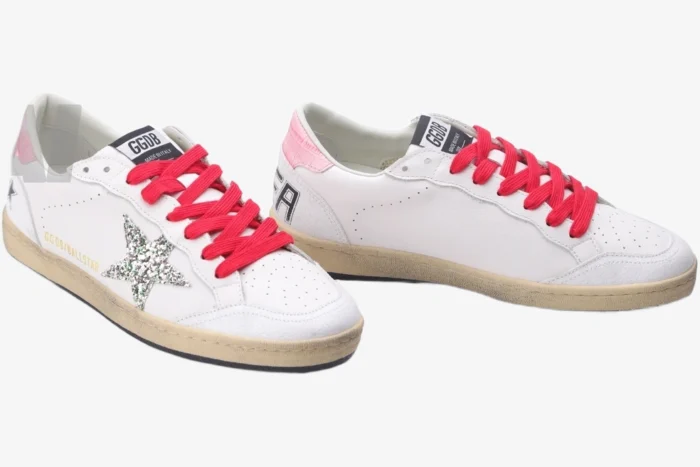 Golden Goose Ball Star white leather sneakers with red laces and a silver glitter star, side view. - SKU GWF00117.F002517.10893