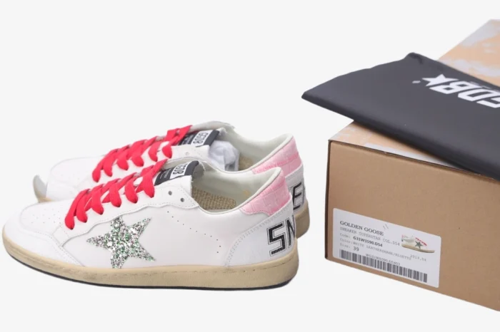 Golden Goose Ball Star white leather sneakers with red laces and silver glitter star, side view next to box. - SKU GWF00117.F002517.10893