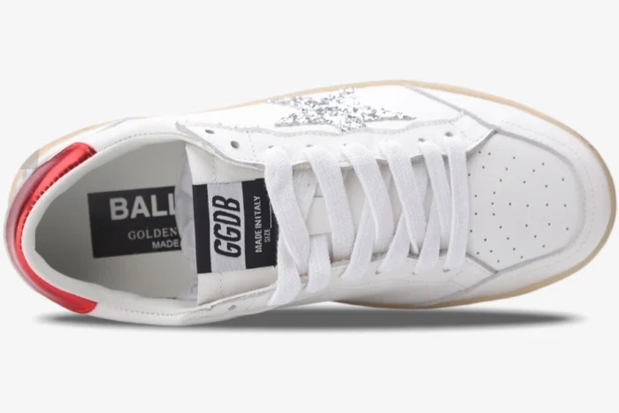 Top-down view of a white Golden Goose Ball Star sneaker with silver glitter star and red heel tab. - SKU GWF00117.F002517.10892