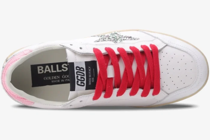 Top-down view of Golden Goose Ball Star white leather sneaker with red laces and silver glitter star. - SKU GWF00117.F002517.10893